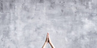 Beautiful young woman doing yoga exercises.